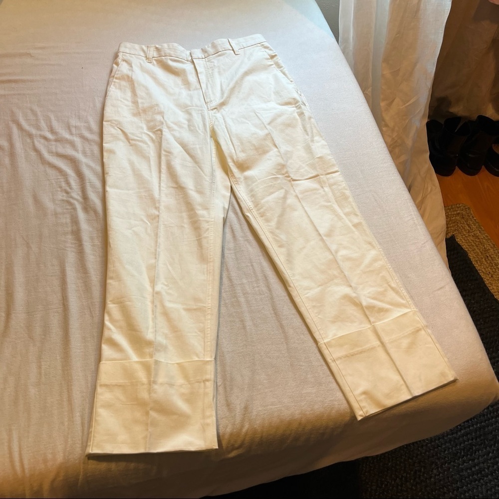 The Script ivory cream wide straight left rolled hem trousers